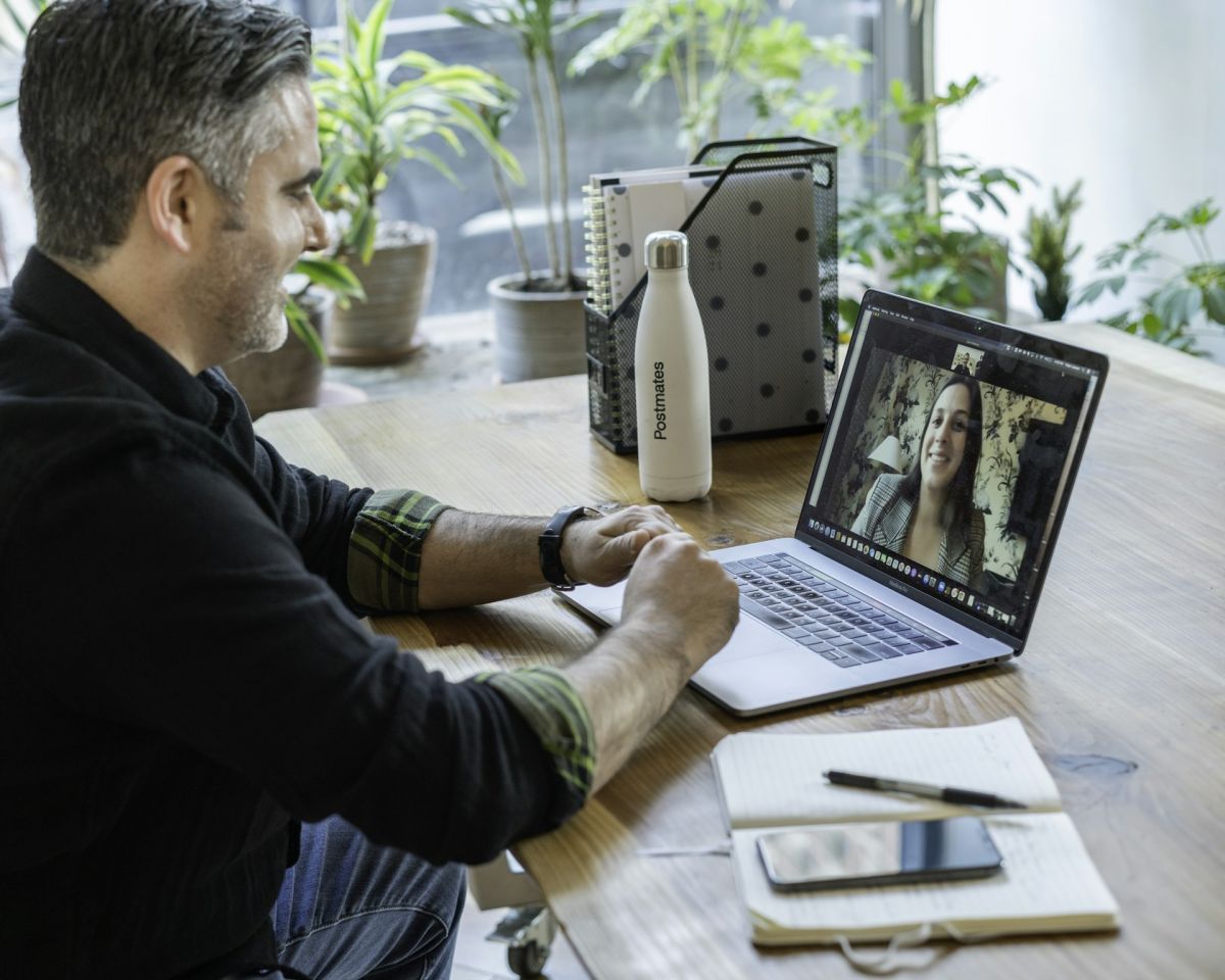 Man on a video call with a laptop at home